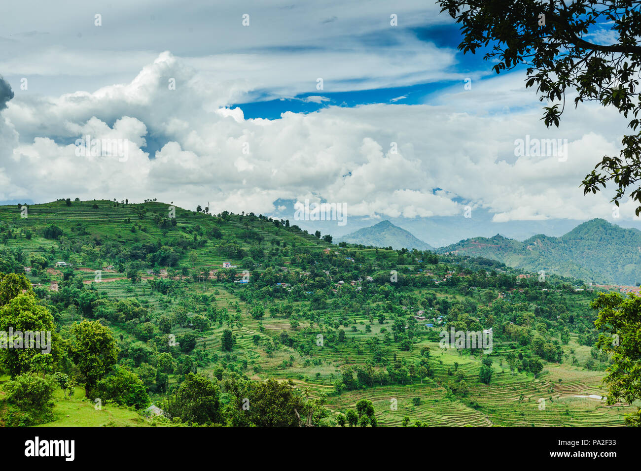 Scenery of beautiful Nepali rural village with mountains and green