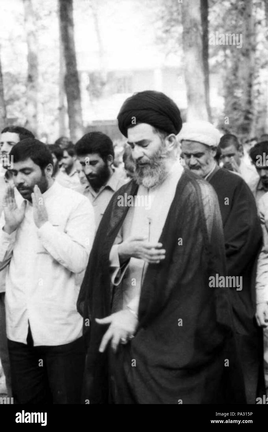 16 Ali Khamenei leading a Jumu'ah of Tehran - 1981 Stock Photo