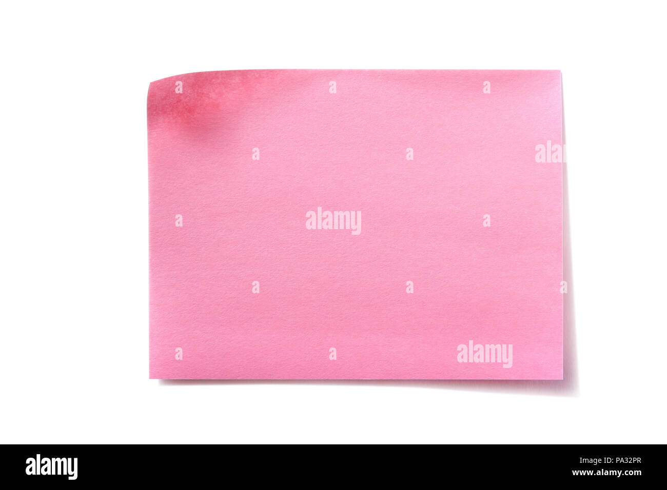 One pink sticky post note isolated white background Stock Photo - Alamy