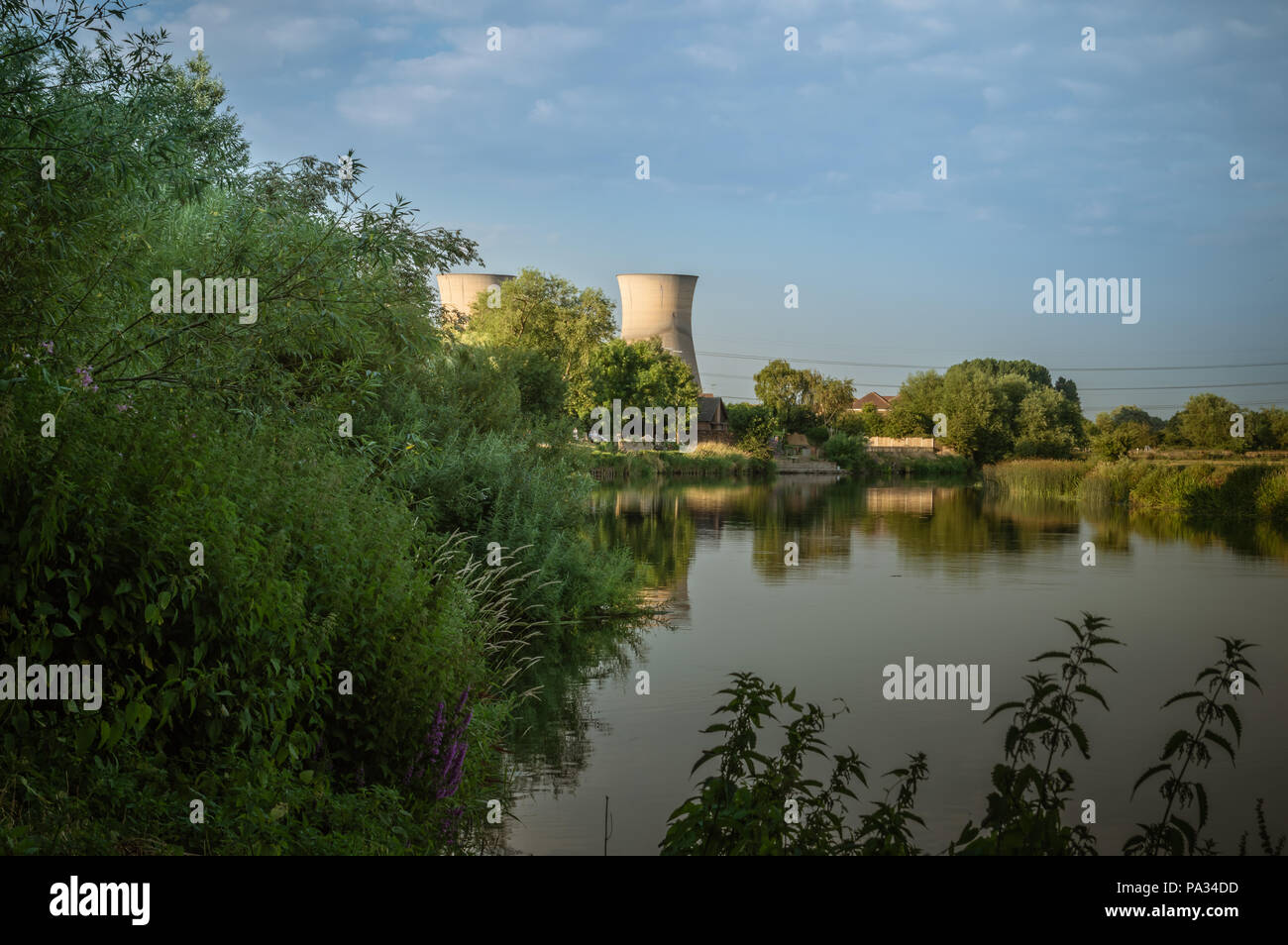 Willington power station cooling towers from the bank of the River Trent at Willington, Derbyshire. Stock Photo