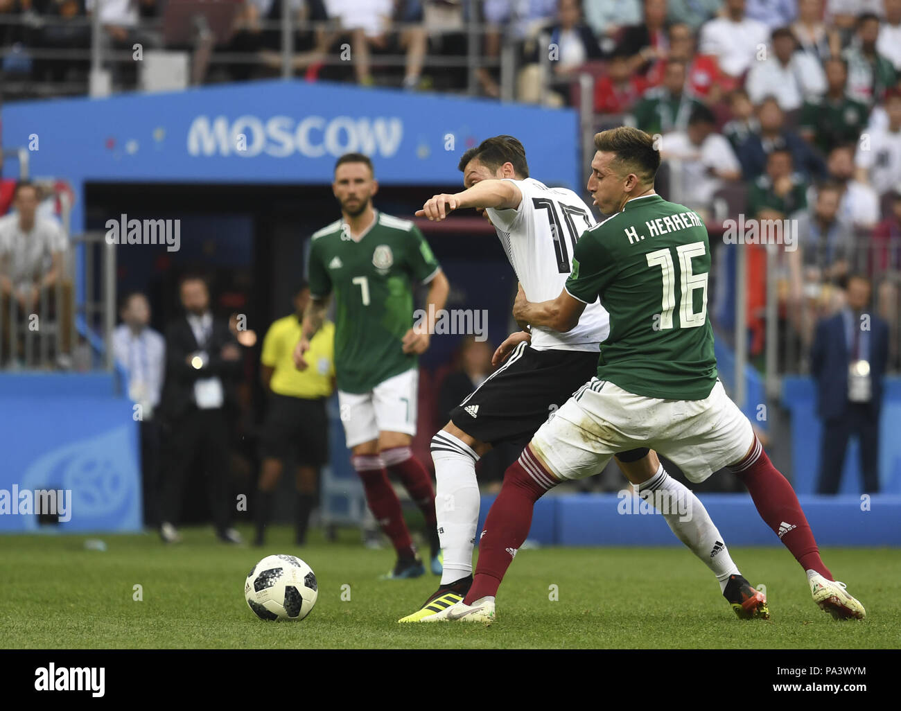 2018 FIFA World Cup Russia: Group F - Germany v Mexico  Featuring: Mesut OEZIL of Germany, Hector HERRERA of Mexico Where: Moscow, Russian Federation When: 17 Jun 2018 Credit: Anthony Stanley/WENN.com Stock Photo