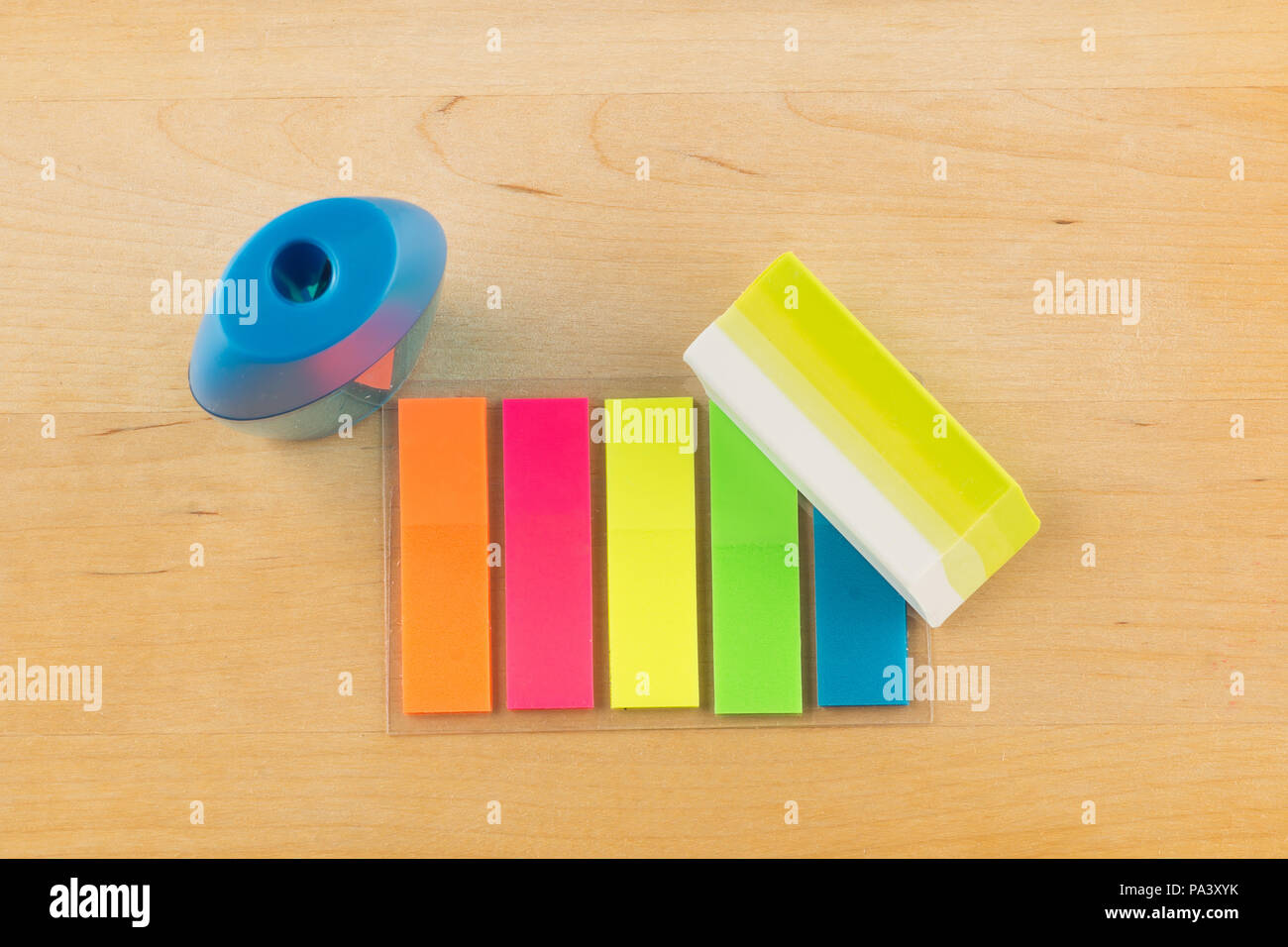Color paper stickers and school writing instruments Stock Photo