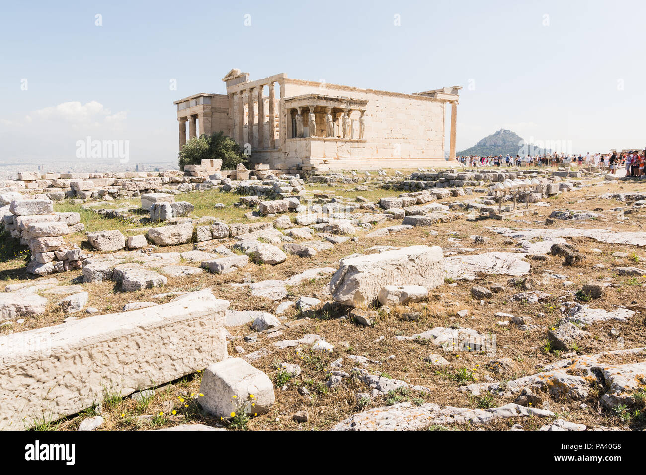 ATHENS, GREECE - MAY 2018: Tourists visiting the ruins of Athena Polias ...