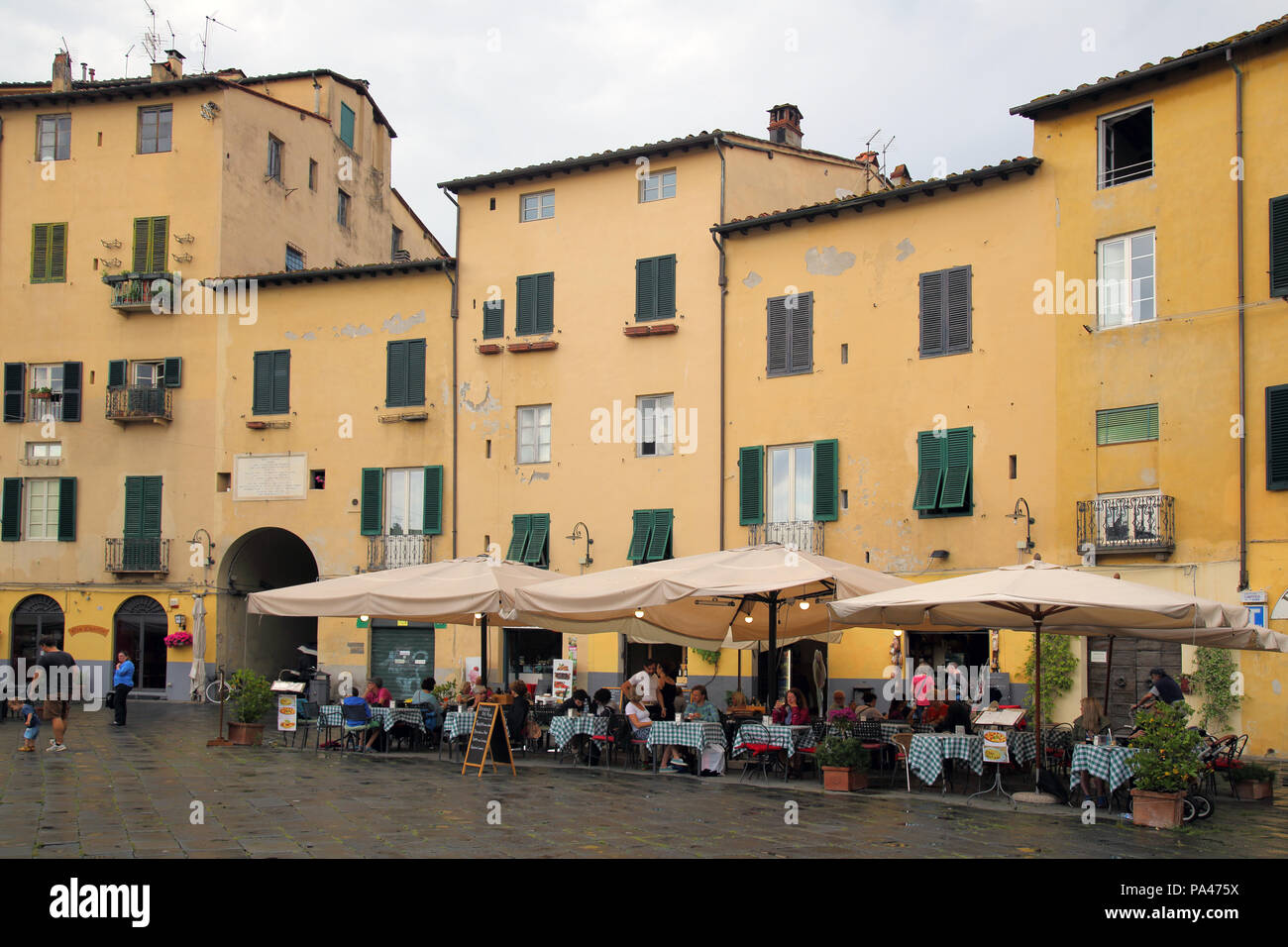buildings around the amphitheater in lucca in tuscany italy Stock Photo
