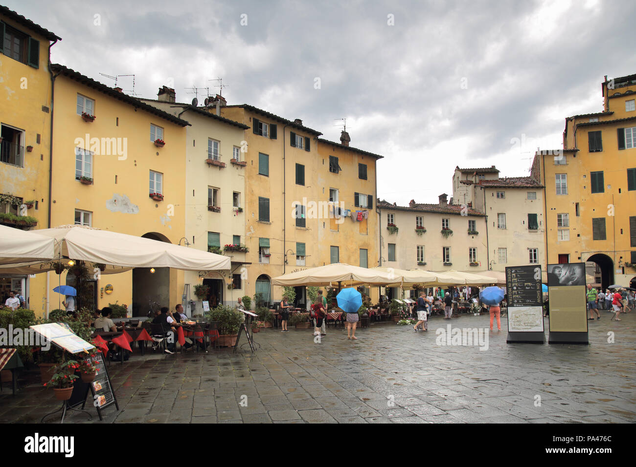 buildings around the amphitheater in lucca in tuscany italy Stock Photo