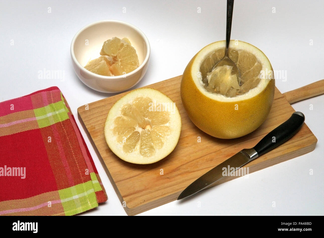 Chinese grapefruit with yogurt and fruit. Step by step. Prepared dish