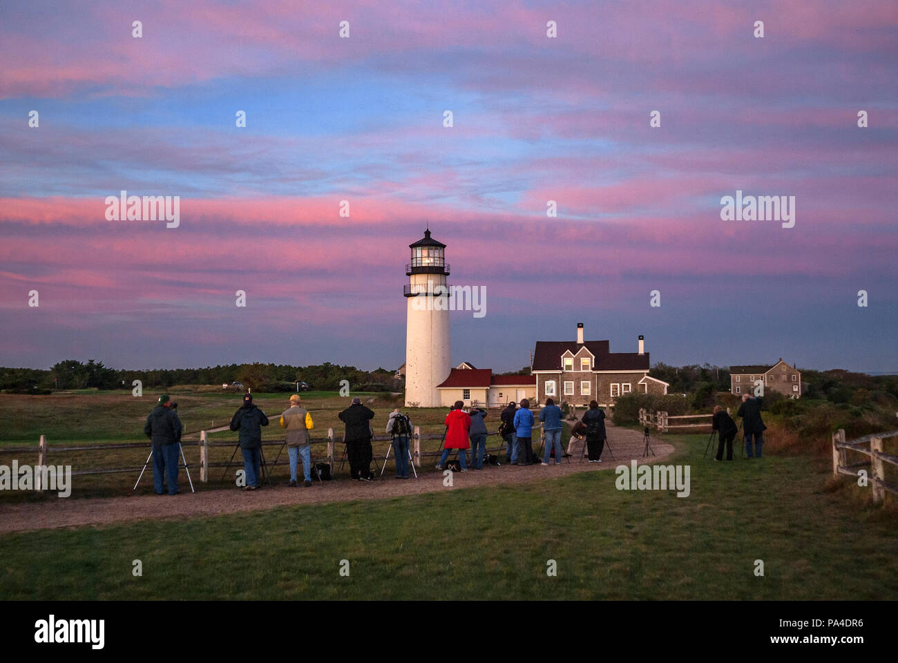 Sunrise location shoot in a travel photography workshop, Highland Lighthouse, Truro, Cape Cod, Massachusetts, USA. Stock Photo