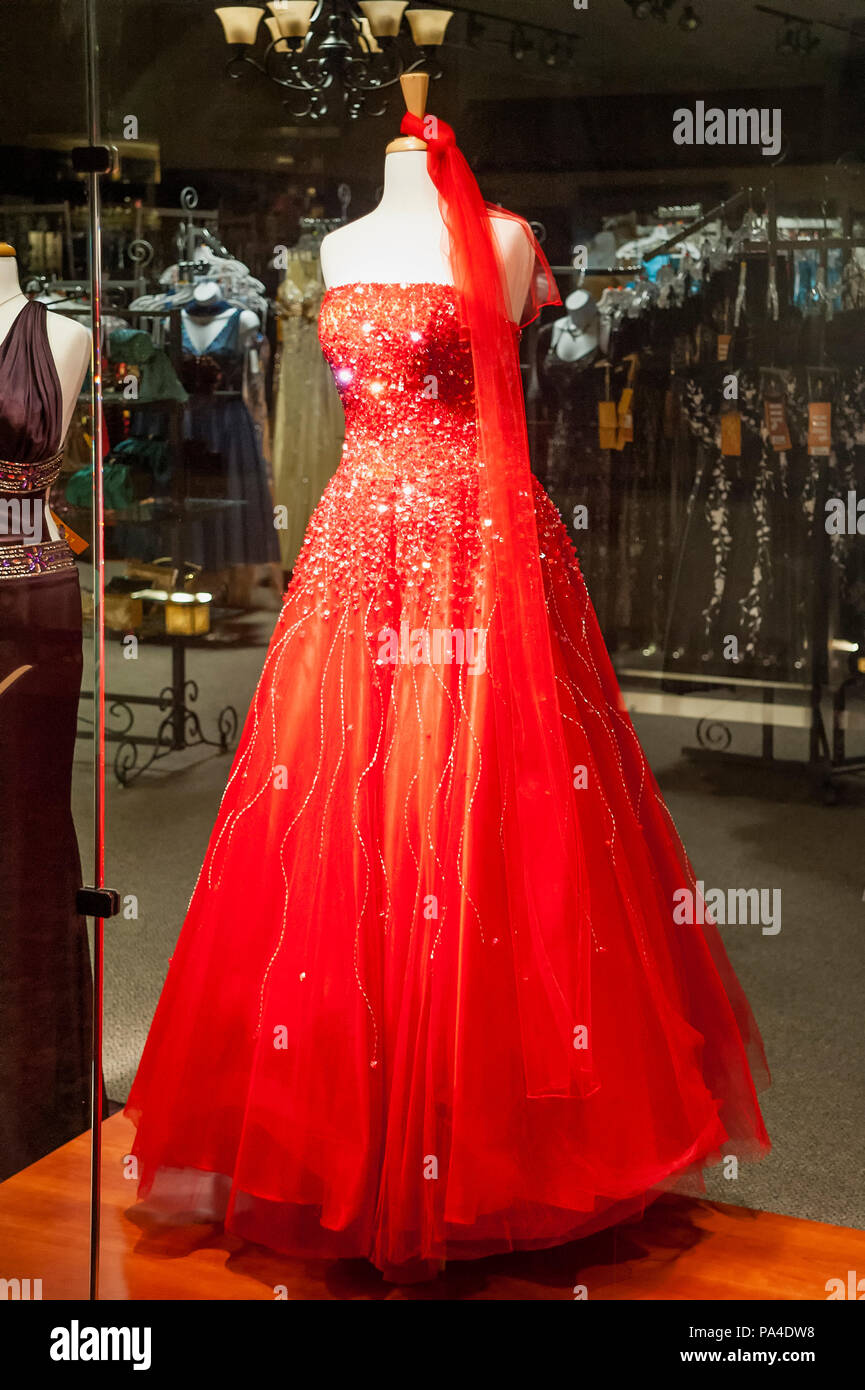 Formal designer gown on store mannequin Stock Photo Alamy
