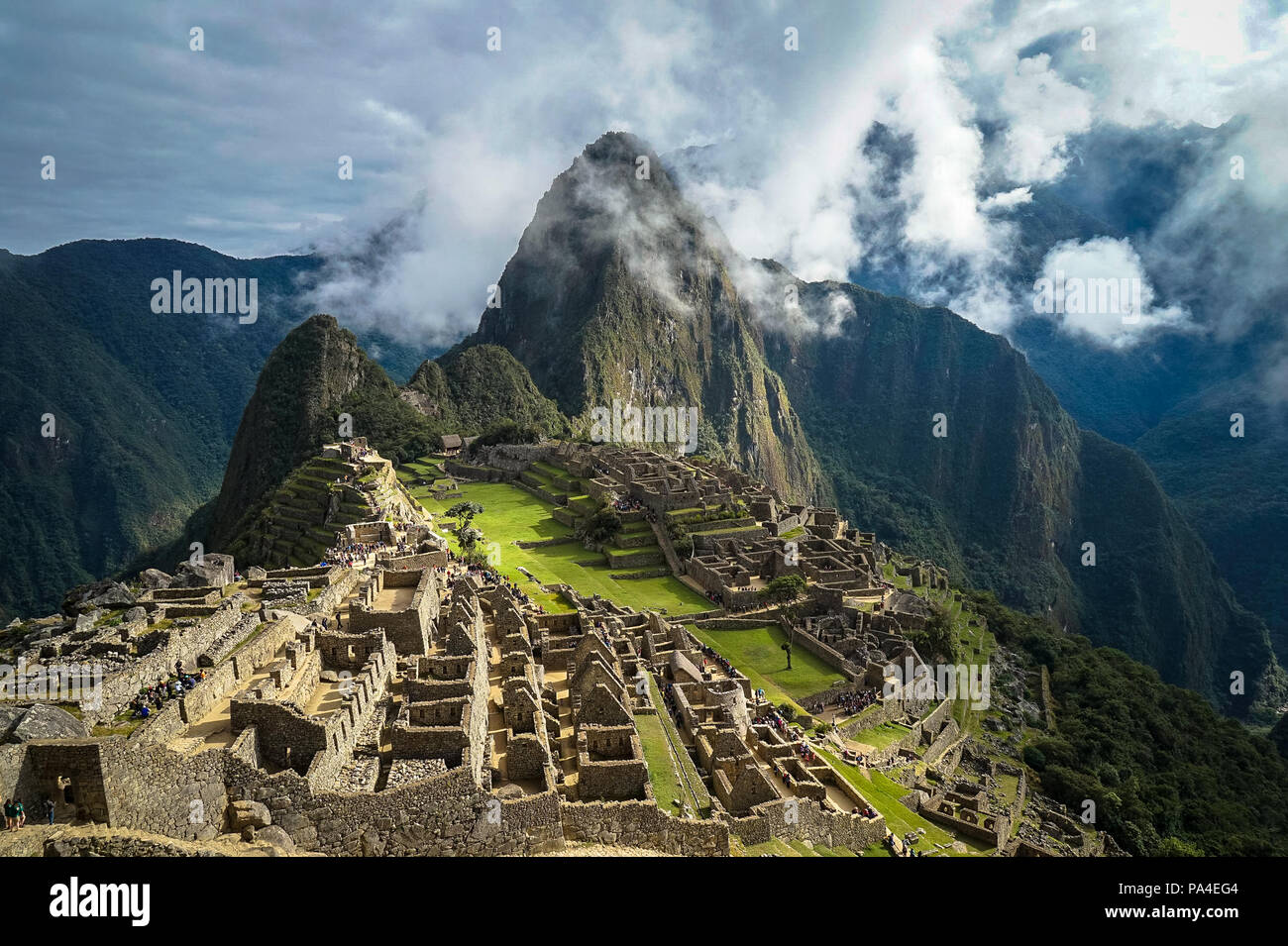 A view of Machu Picchu partially covered with clouds Stock Photo