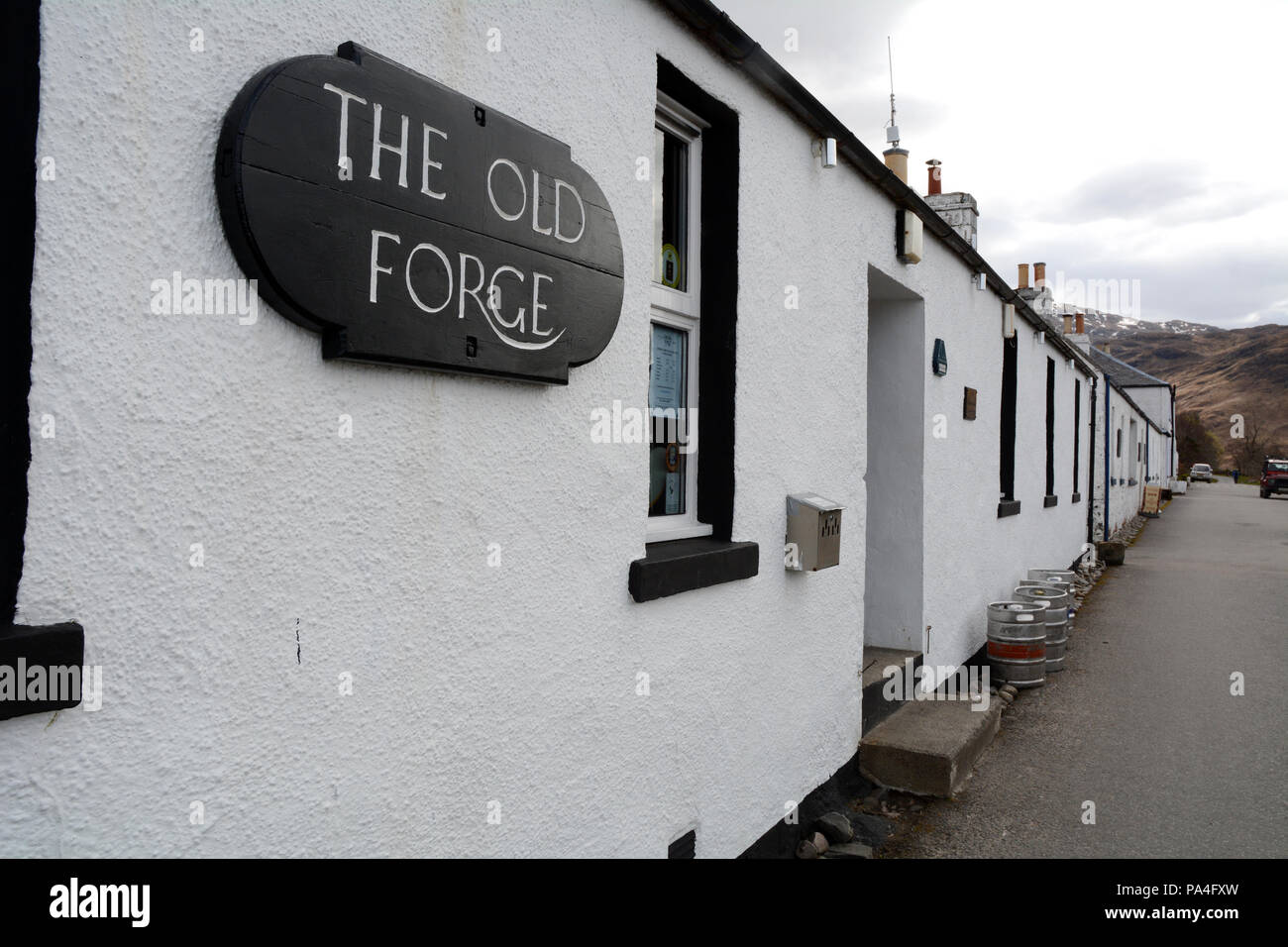The exterior of The Old Forge, the most remote pub in the mainland UK, in the town of Inverie, Knoydart Peninsula, Scotland, Great Britain. Stock Photo