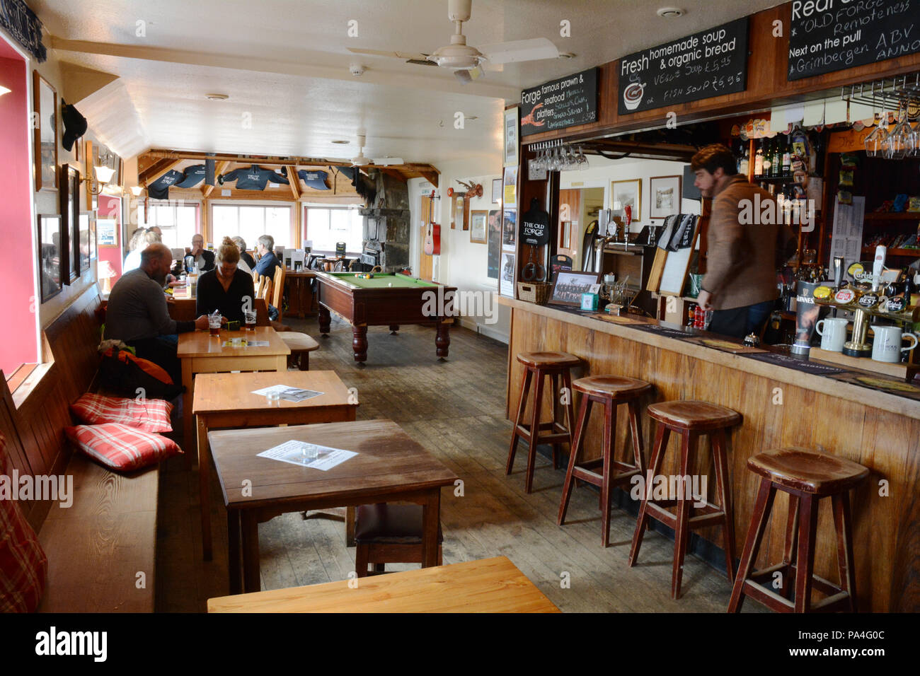 The interior of The Old Forge, the most remote pub in the mainland UK, in the town of Inverie, Knoydart Peninsula, Scotland, Great Britain. Stock Photo