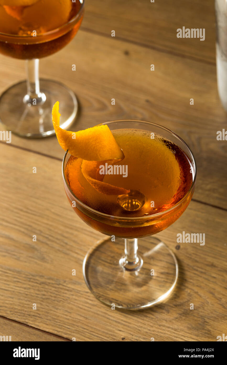 Alcoholic Martinez Cocktail with Gin Vermouth and Orange Peel Stock