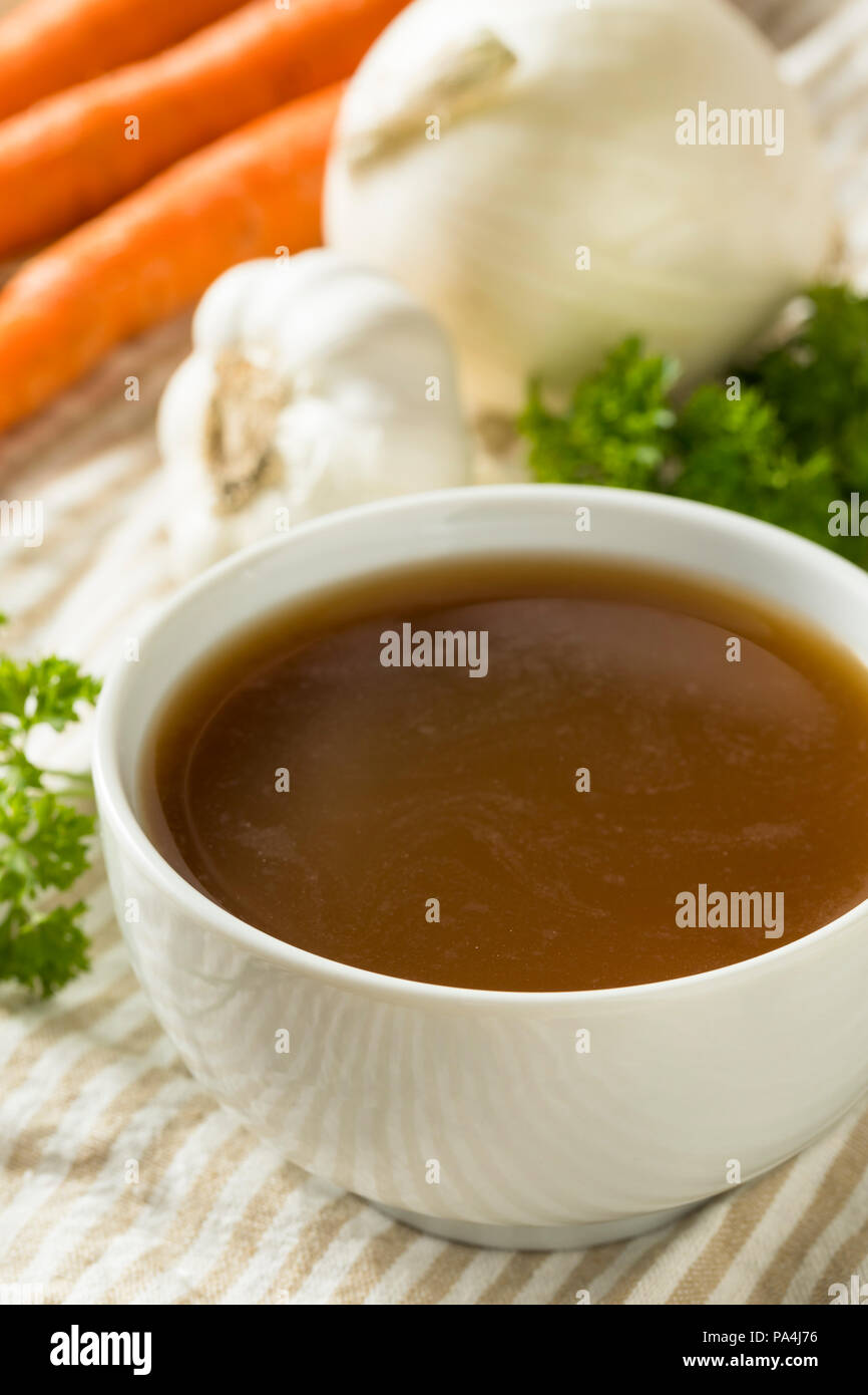 Homemade Organic Beef Bone Broth in a Bowl Stock Photo Alamy