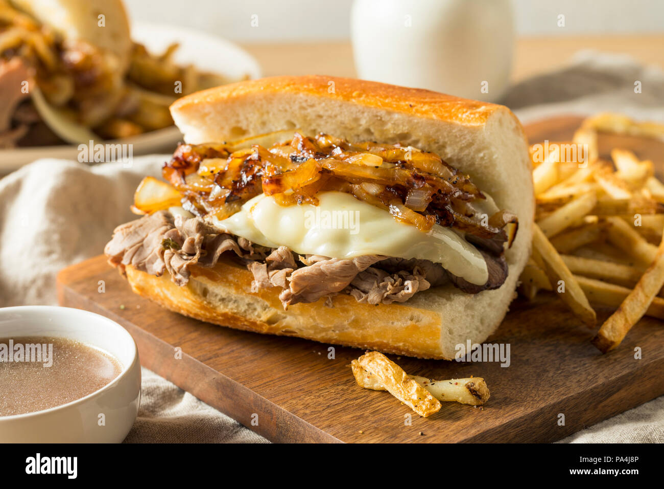 Homemade Beef French Dip Sandwich with French Fries Stock Photo Alamy