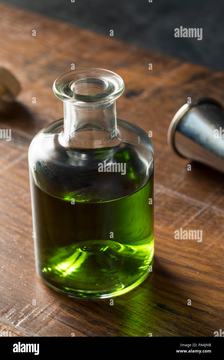 Alcoholic Green Absinth Apertif in a Bottle for Cocktails Stock Photo