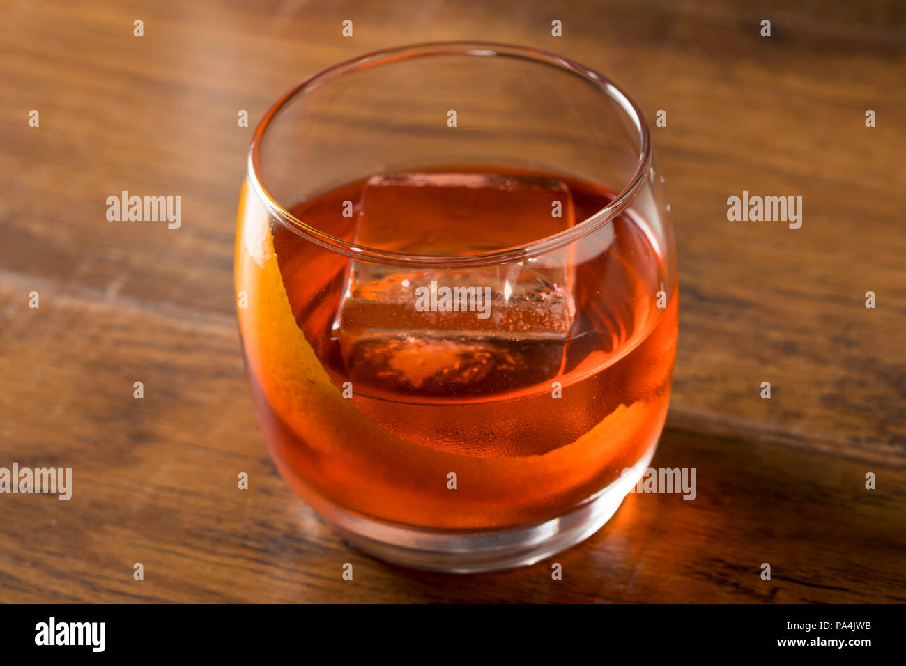 Alcoholic Red Negroni Cocktail with Vermouth Gin and Oranges Stock