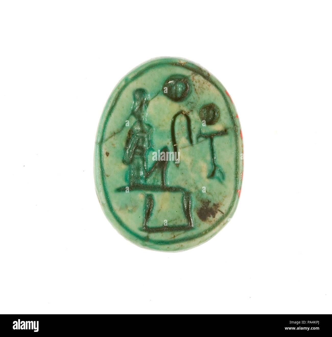 Scarab Inscribed Maatkare (Hatshepsut), She Lives. Dimensions: L. 1.6 cm (5/8 in.); w. 1.2 cm (1/2 in.). Dynasty: Dynasty 18, early. Reign: Joint reign of Hatshepsut and Thutmose III. Date: ca. 1479-1458 B.C..  During the 1926-1927 excavation season, the Museum's Egyptian Expedition uncovered three foundation deposits along the eastern enclosure wall of Hatshepsut's funerary temple at Deir el-Bahri in Western Thebes.  Among the contents were 299 scarabs and stamp-seals. Sixty-five of these are now in the Egyptian Museum, Cairo, and the rest were acquired by the Museum in the division of finds. Stock Photo