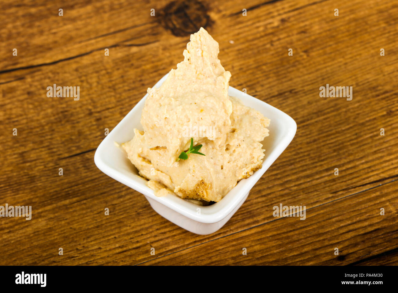 Vegetarian Humus with sesame seeds and thyme leaves Stock Photo Alamy