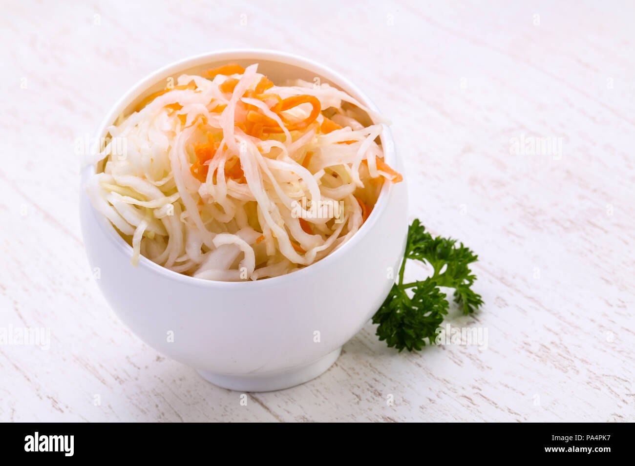 Traditional fermented cabbage sauerkraut in the bowl Stock Photo Alamy
