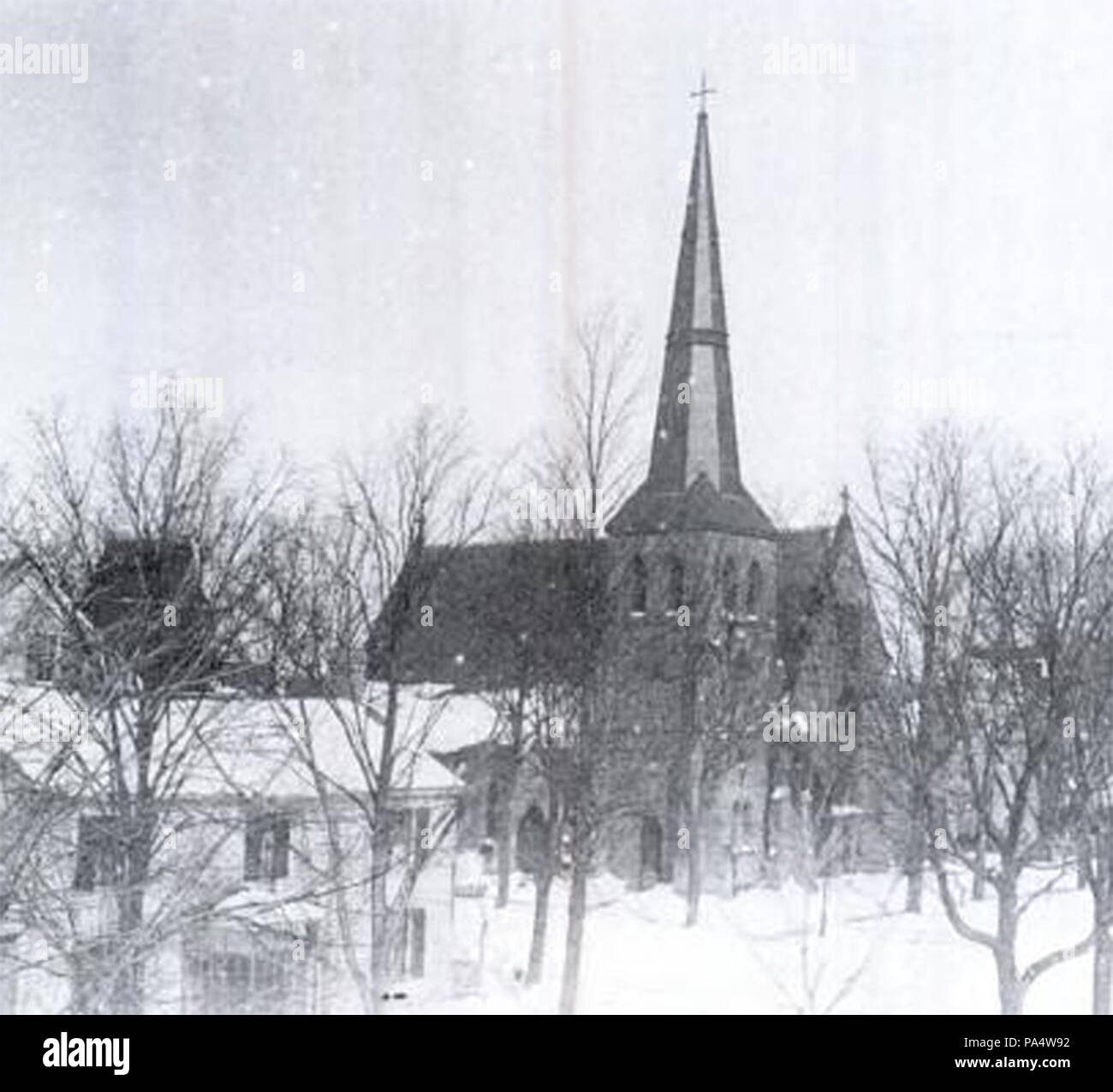 . English: Photograph of Christ Church (A/K/A/ Christ Episcopal Church) in Newton, Sussex County, New Jersey, circa Winter 1910 seen from the balcony of a home on Main Street in Newton. Taken in 1910 308 Christ Church Newton NJ Winter 1910 Stock Photo