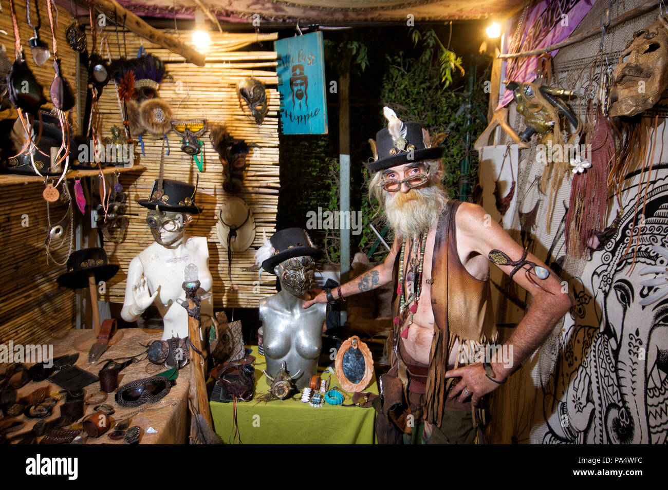 Old hippie at his stall, Las Dalias Market, Ibiza Stock Photo