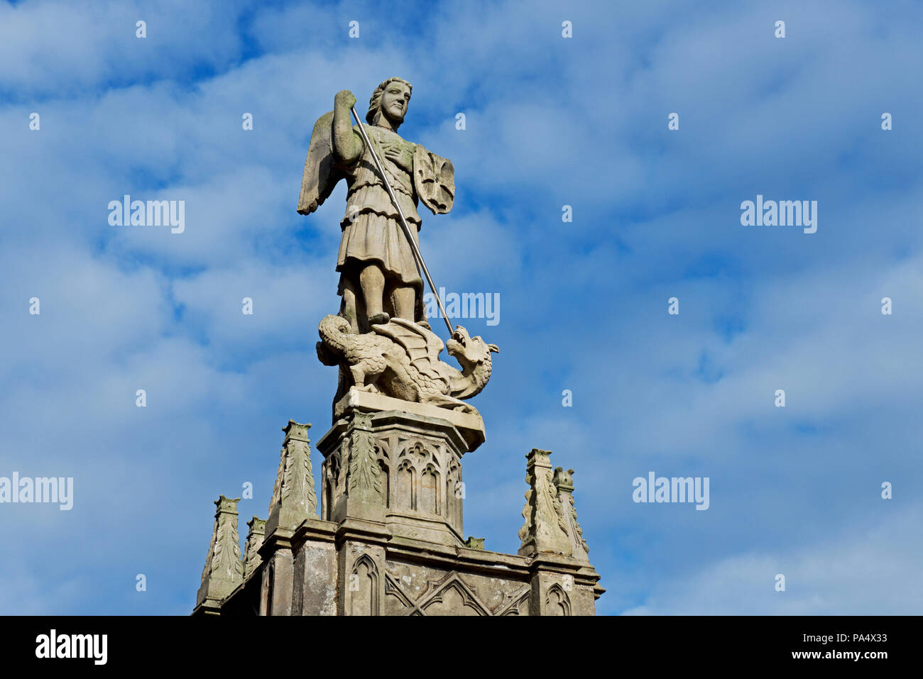 Statue of St George killing the dragon, Alnwick, Northumberland, England UK Stock Photo