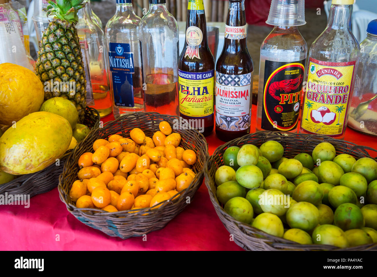 CAIRU, BRAZIL - CIRCA FEBRUARY, 2018: Rustic Brazilian beach shack sells alcoholic drinks made with tropical fruits. Stock Photo