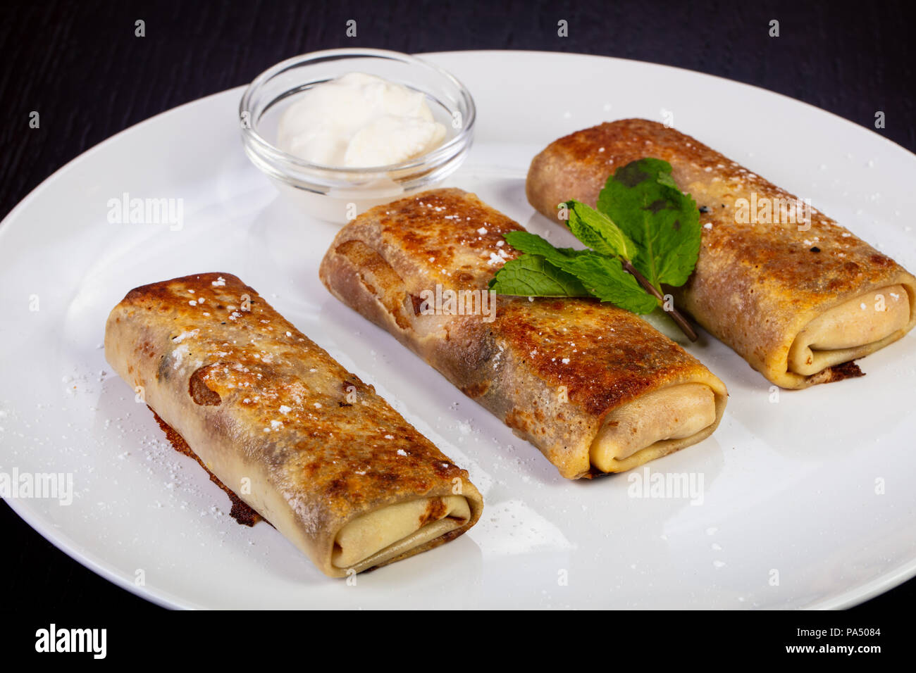 Delicious Pancake Rolls With Cottage Cheese Stock Photo 212780964