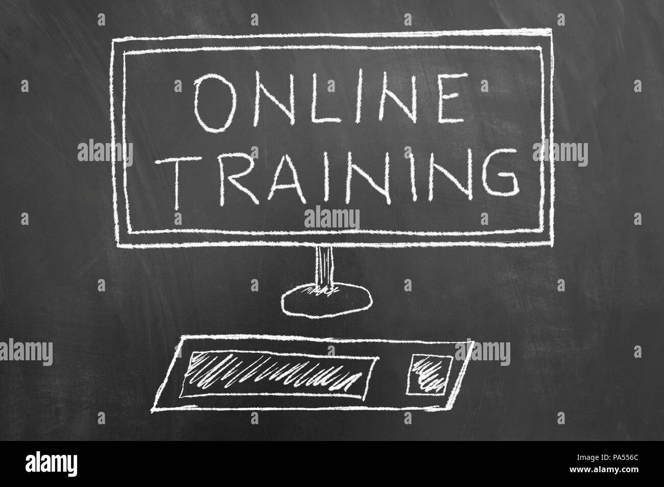 online training text and computer drawing on chalkboard or online chalkboard