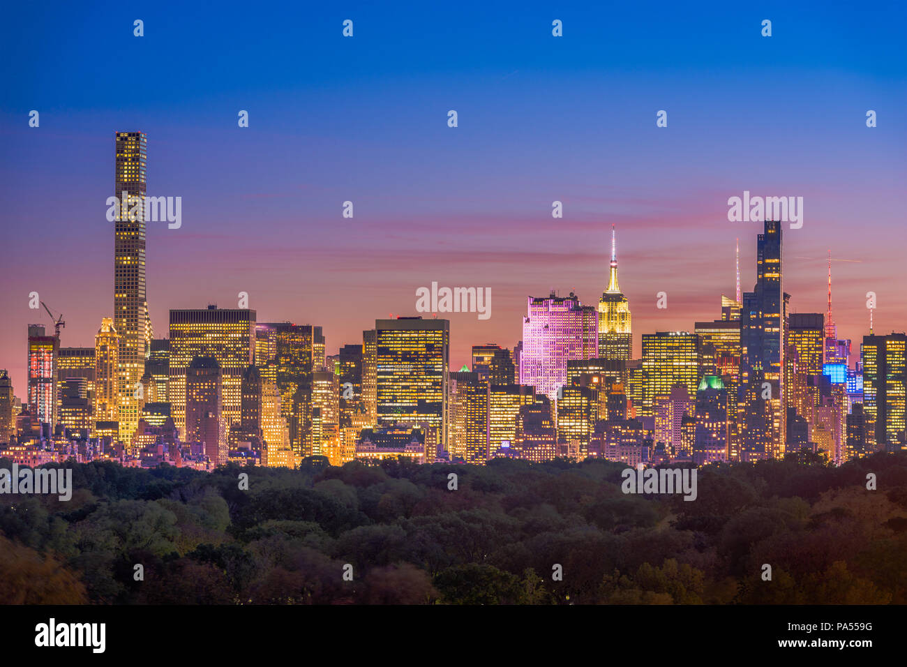 New York, New York midtown Manhattan cityscape over Central Park at twilight. Stock Photo