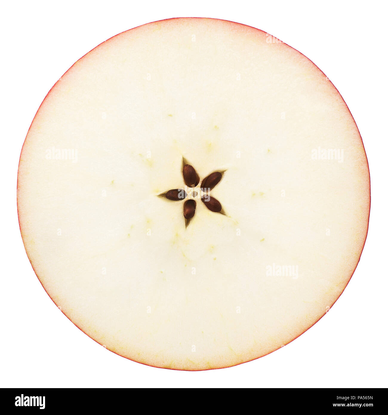 the cut apple in half, in the middle a seed, separately on a whi Stock Photo