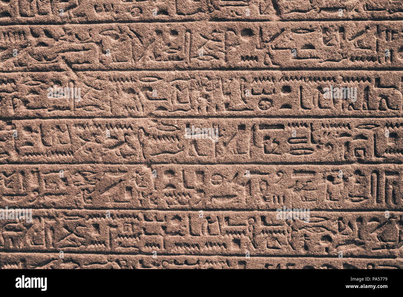 egypt hieroglyphs carved on the stone Stock Photo - Alamy
