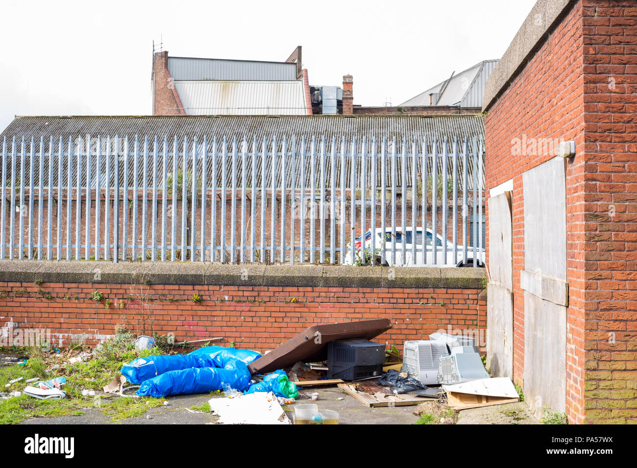 Fly tipping / dumped rubbish on a street in Liverpool Stock Photo