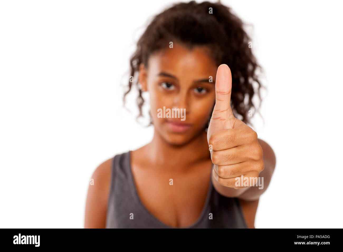 beautiful and happy african girl shows thumbs up Stock Photo - Alamy