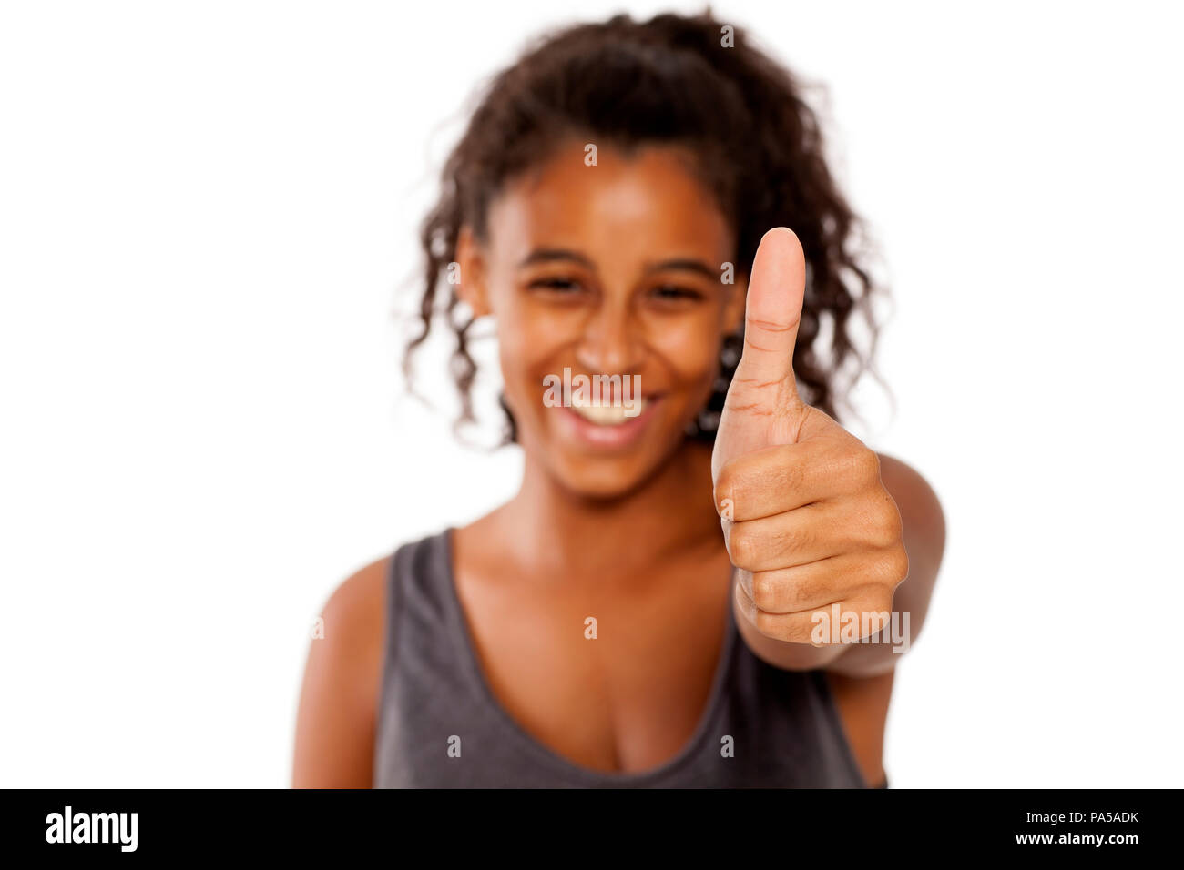 beautiful and happy african girl shows thumbs up Stock Photo - Alamy