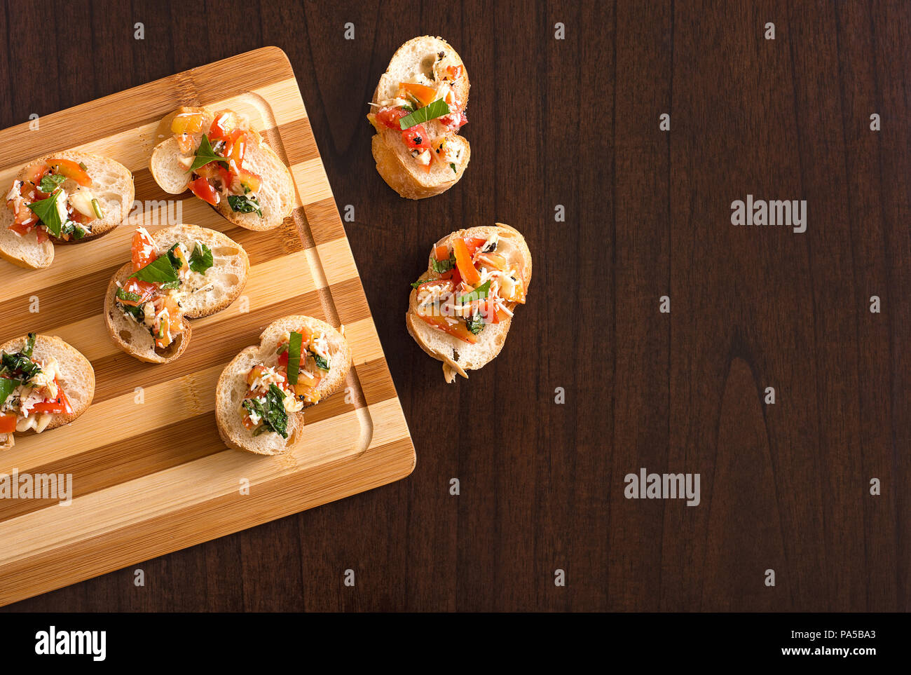 bruschetta on baking tray flat lay image with copy space. Stock Photo