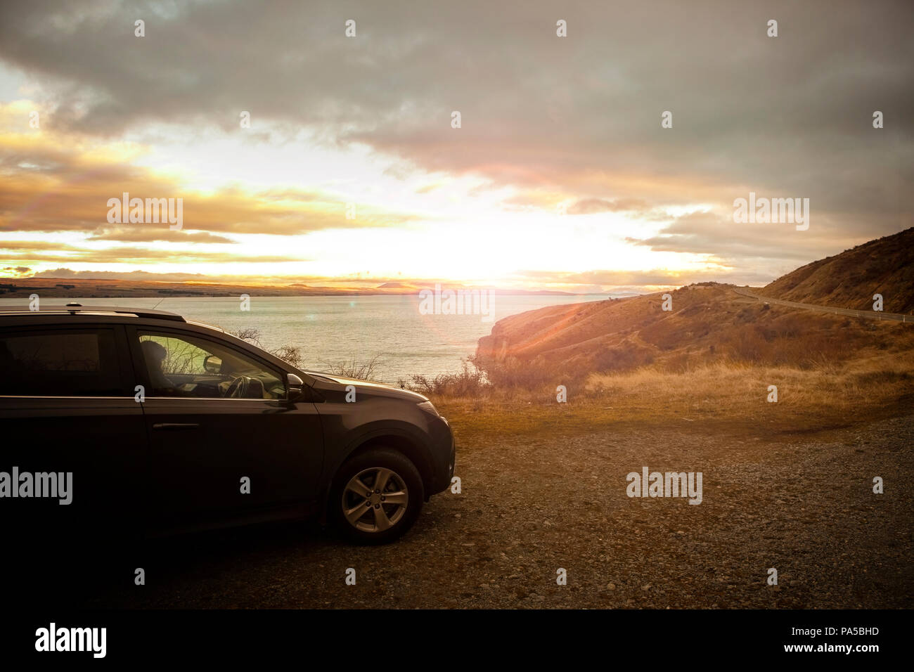 tourist car parking beside lake pukaki in aoraki mt.cook national