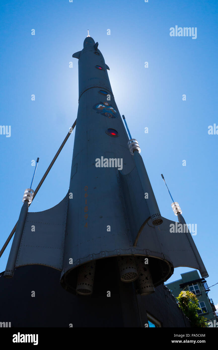 Vertical, backlit shot of the Rocket located in Fremont neighborhood of Seattle Washington Stock Photo