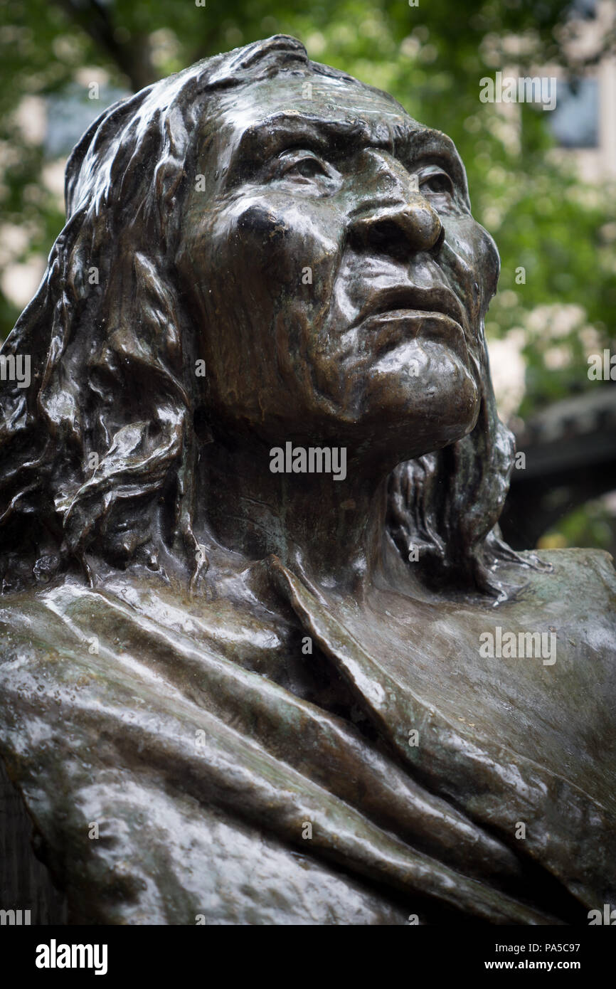 Bronze sculpture of Chief Seattle Chief of the Suquamish located in Pioneer Square in Seattle Washington. Stock Photo