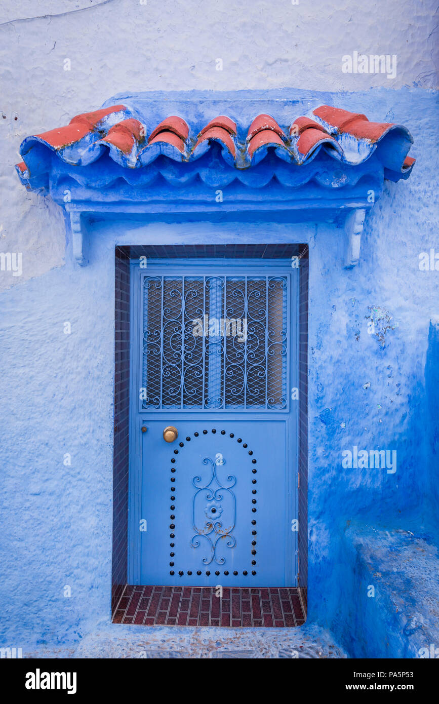 Blue front door, house facade, blue painted house, medina of