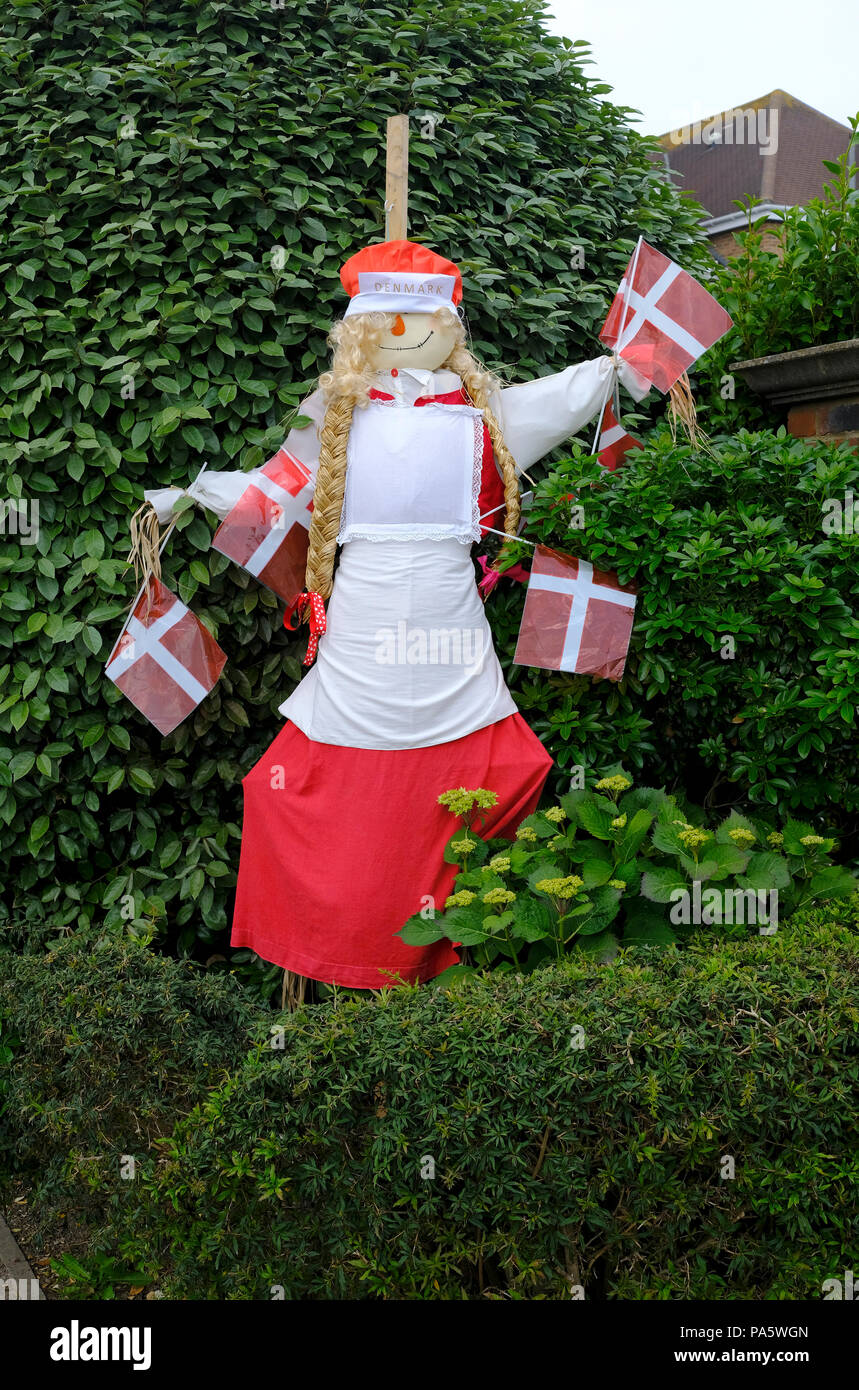Female Scarecrow with Danish flags Stock Photo
