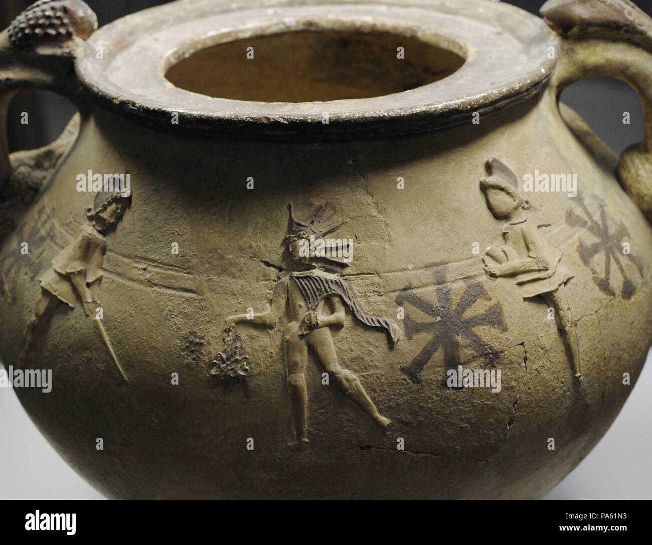 Pottery depicting Mithras surrounded by the torch-bearers Cautes and Cautopates. 2nd-3rd centuries. From Cologne, Germany. Roman-Germanic Museum. Cologne. Germany. Stock Photo