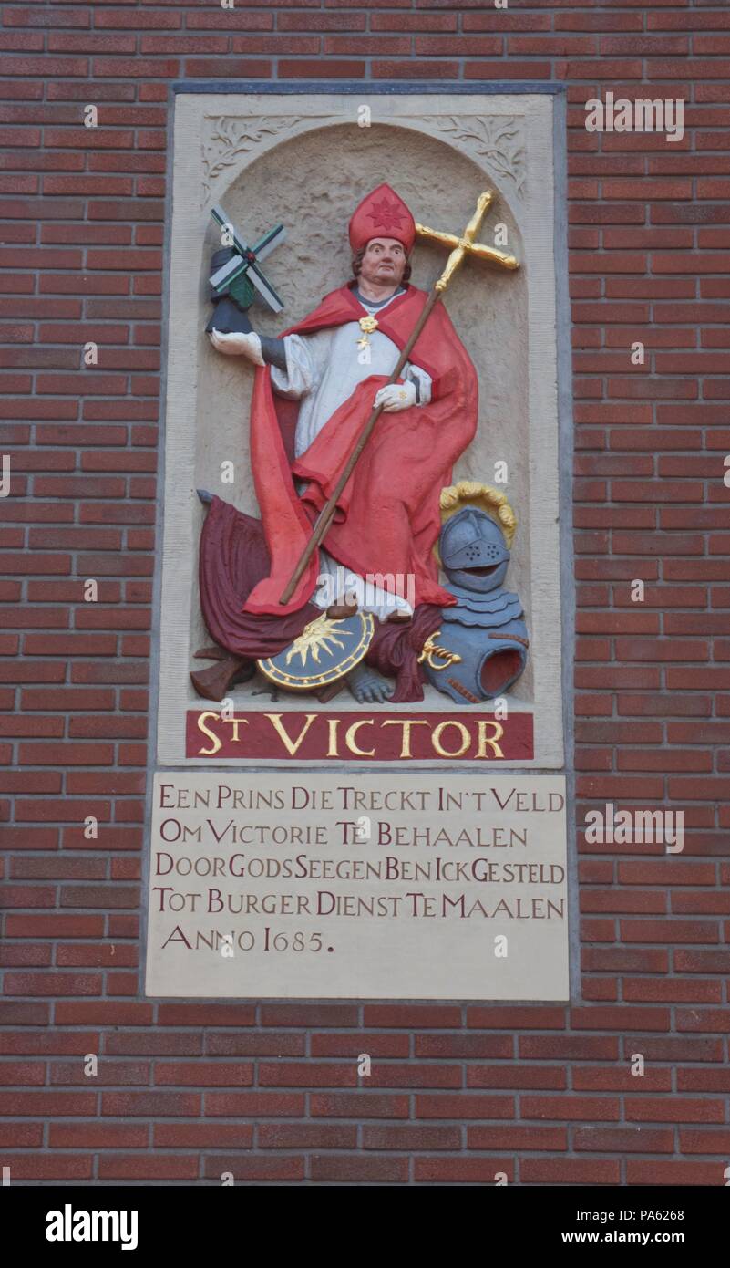 Saint Victor of Marseilles relief on the wall of a fire station on the corner of the Marnixstraat and the Rozengracht in Amsterdam Stock Photo