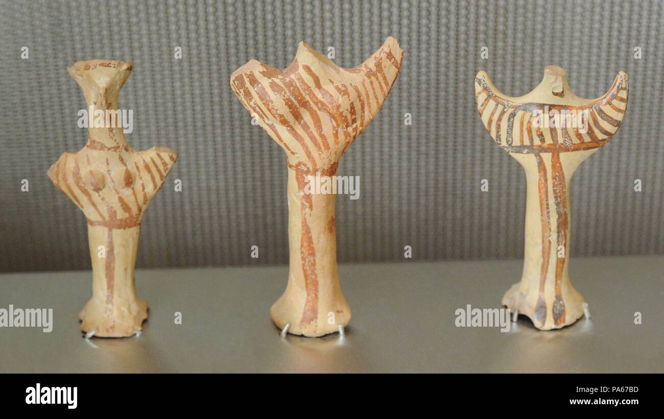 Mycenaean civilization.Left. Female figure . 13001050 BC. Center and