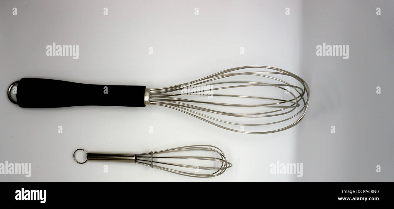 egg whip and spoons Stock Photo Alamy