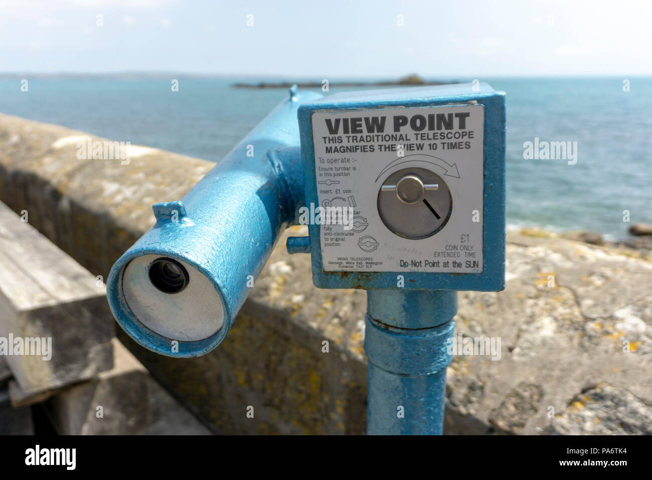 Old fashioned coin operated telescope in Mousehole Cornwall UK