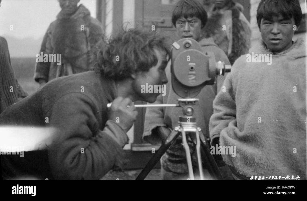 24 Assaajug using movie camera - Inuit - Pangnirtung Nunavut 1929 Stock ...