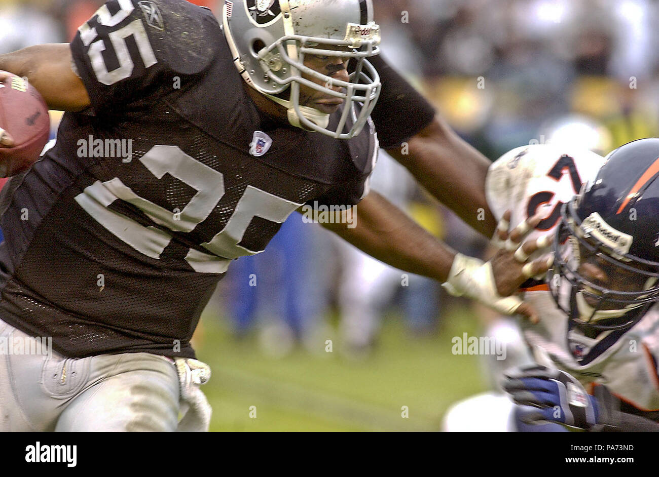 Oakland, California, USA. 21st Dec, 2008. Oakland Raiders FB Luke Lawton  #44 get past Houston Texans safety Nick Ferguson #25 on Sunday, December  21, 2008, at Oakland-Alameda County Coliseum in Oakland, California.