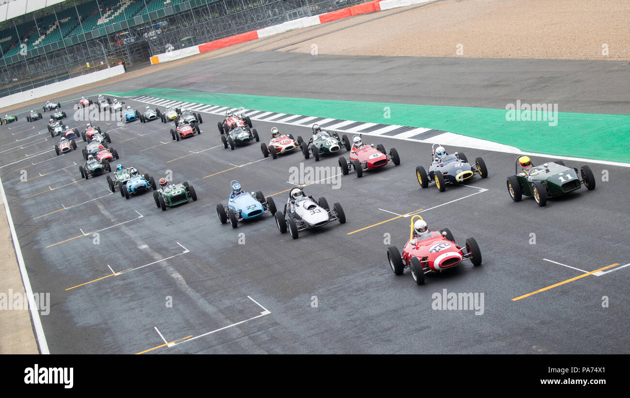 Silverstone, UK. 20th July 2018. First race of the day at the Silverstone Classic. The Historic Formula Juniors first race with a huge 54 car grid Credit James Wadham / Alamy Live News Stock Photo