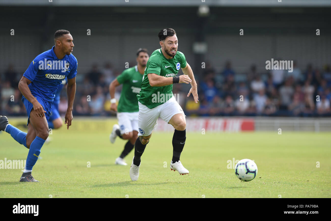 Kingston London UK 21st July 2018 - Richie Towell of Brighton on the ball during the pre season friendly football match between AFC Wimbledon and Brighton and Hove Albion  at the Cherry Red Records Stadium in Kingston Surrey Editorial Use Only Stock Photo